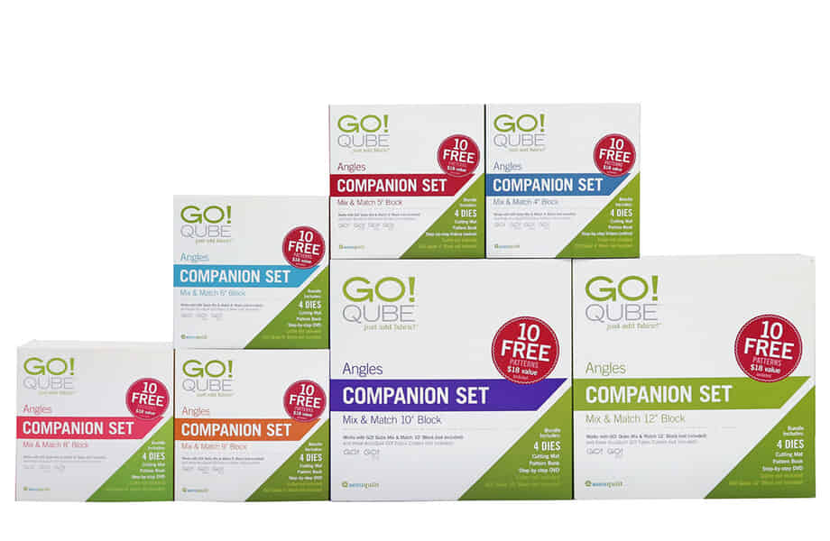 image of AccuQuilt Ready. Set. GO! Ultimate Fabric Cutting System with cutter, Qube die set, strip cutter die, cutting mat, and Qube book